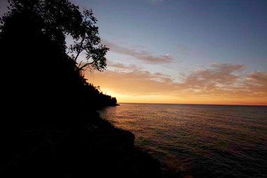 A Cave Point sunrise over Lake Michigan.