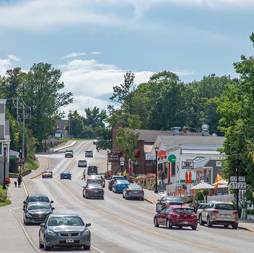 A busy street of cars driving