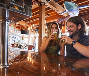 A couple enjoying beers