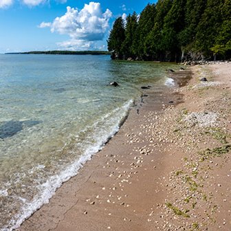 Water and sand along the lake shoreline