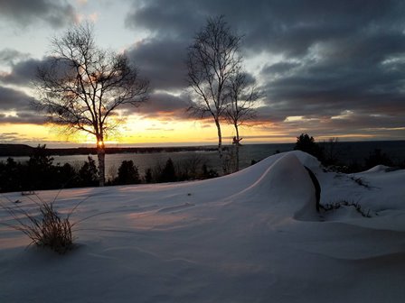 Snow-covered banks along the lake