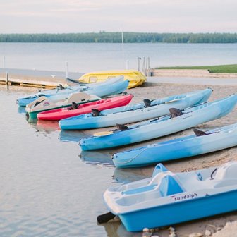 Kayaks beached on the sand