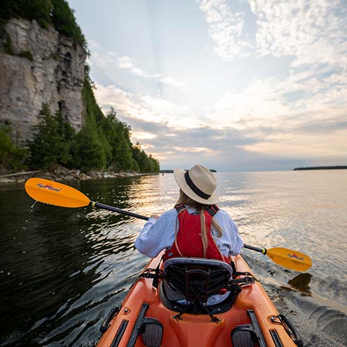 Woman kayaking on the lake