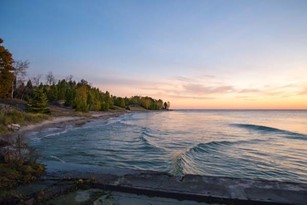 The lakeshore at sunset.