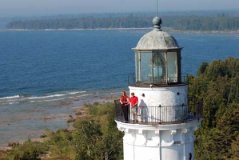 People out on the top of the Cana Island lighthouse.