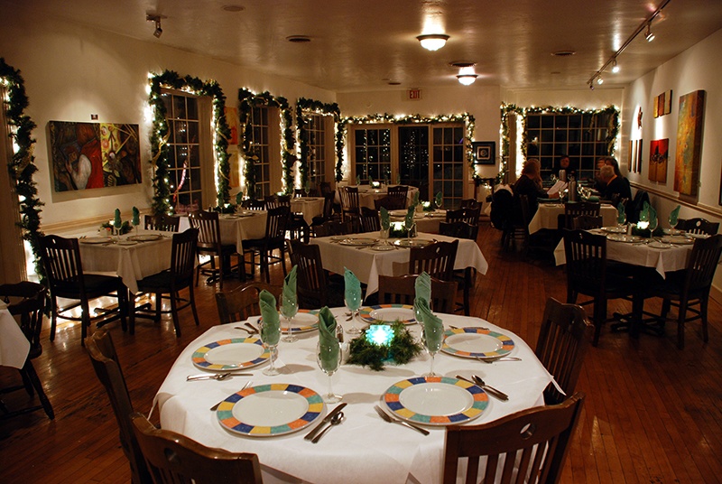 Inside a beautifully decorated restaurant at Christmastime