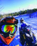 Snowmobilers taking a selfie.