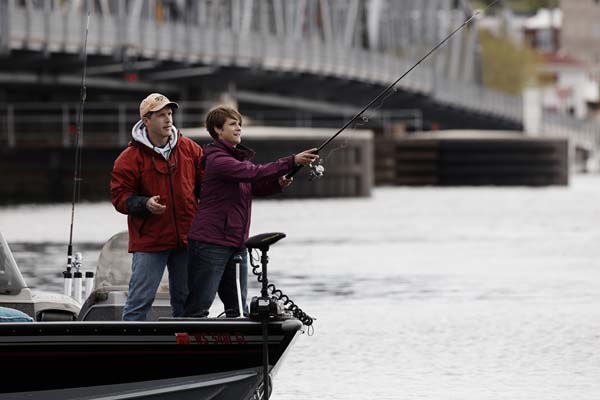 A couple fishes near the Sturgeon Bay Steel Bridge.