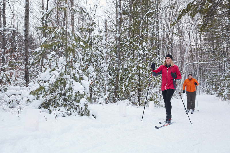 Couple cross country skiing at Peninsula State Park