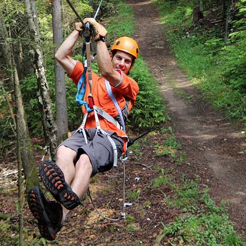 A man ziplining