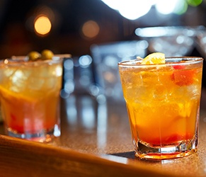 Close up of cocktails on a bar