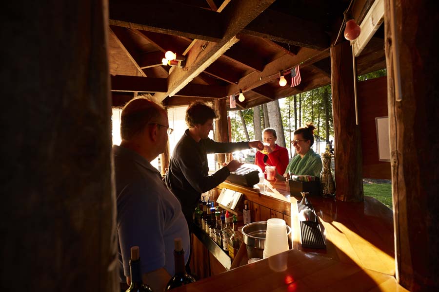 Visitors to an outdoor theater buy snacks and drinks.