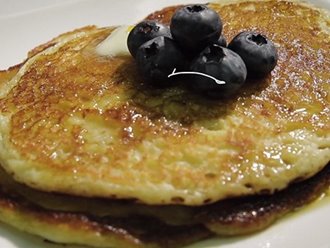 Stack of pancakes with blueberries on top