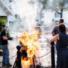 People tending a fish boil