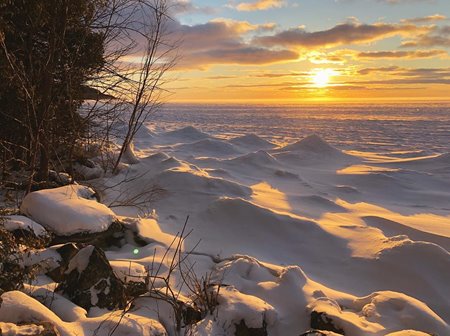 Snow mounds on the lake