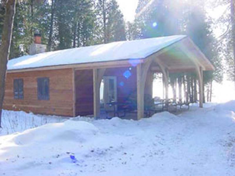 A snowy shelter in the park.