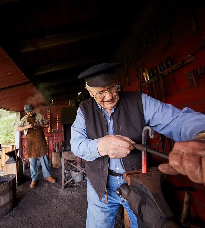 Blacksmith doing metal work.