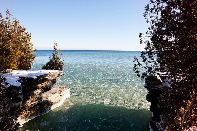 Two cliffs overlooking a body of water